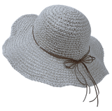 gray-packable-crochet-hat-folded-in-luggage